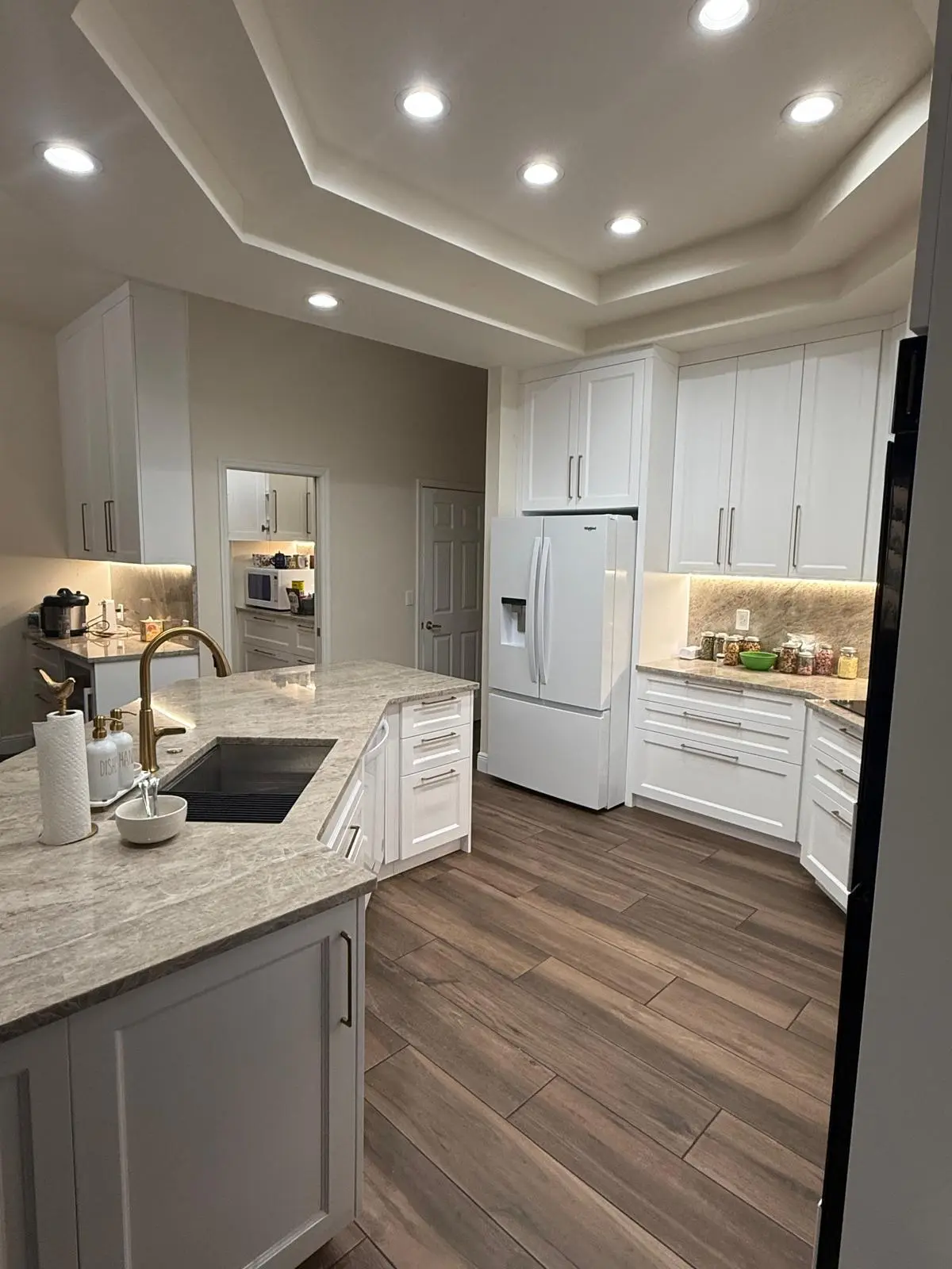 Master woodworker at DS Fine Wood Design crafting custom kitchen cabinets in Tampa
