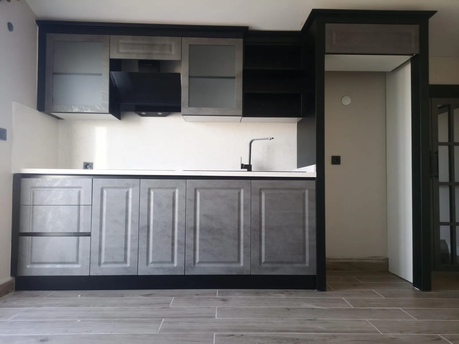 Industrial-Chic Two-Tone Kitchen Remodel, Kitchen Cabinets & Remodeling project in Sarasota — photo 2 of 10